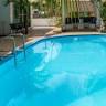 Coconut Palms Pool and Bungalows